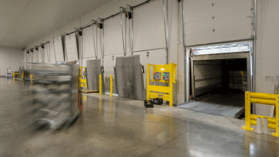 Internal view of container loading docks in a warehouse