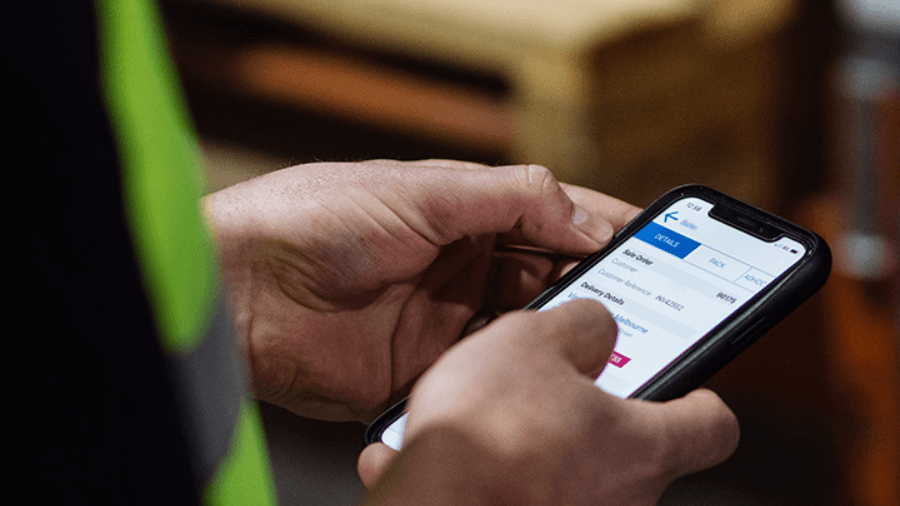 Person using WMS app on a smart phone.