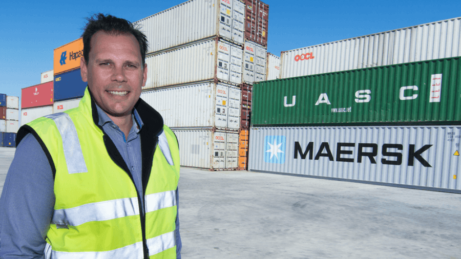 uTenant Founder, Matt Sampson, standing in container yard.
