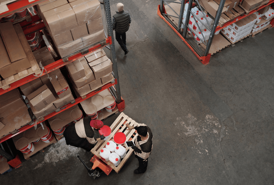 An aerial view of two people discussing 3PL storage rates in Q1 2025